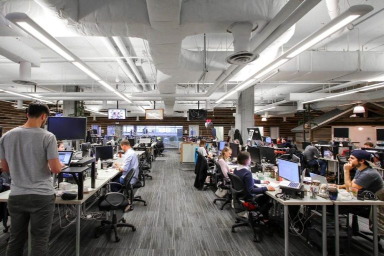 Hootsuite employees work at the company's main sales office in Vancouver, British Columbia. FILE. December 15, 2016. Glassdoor.