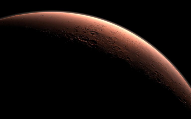 This computer-generated images depicts daybreak at Gale Crater on Mars. Image Credit: NASA/JPL-Caltech