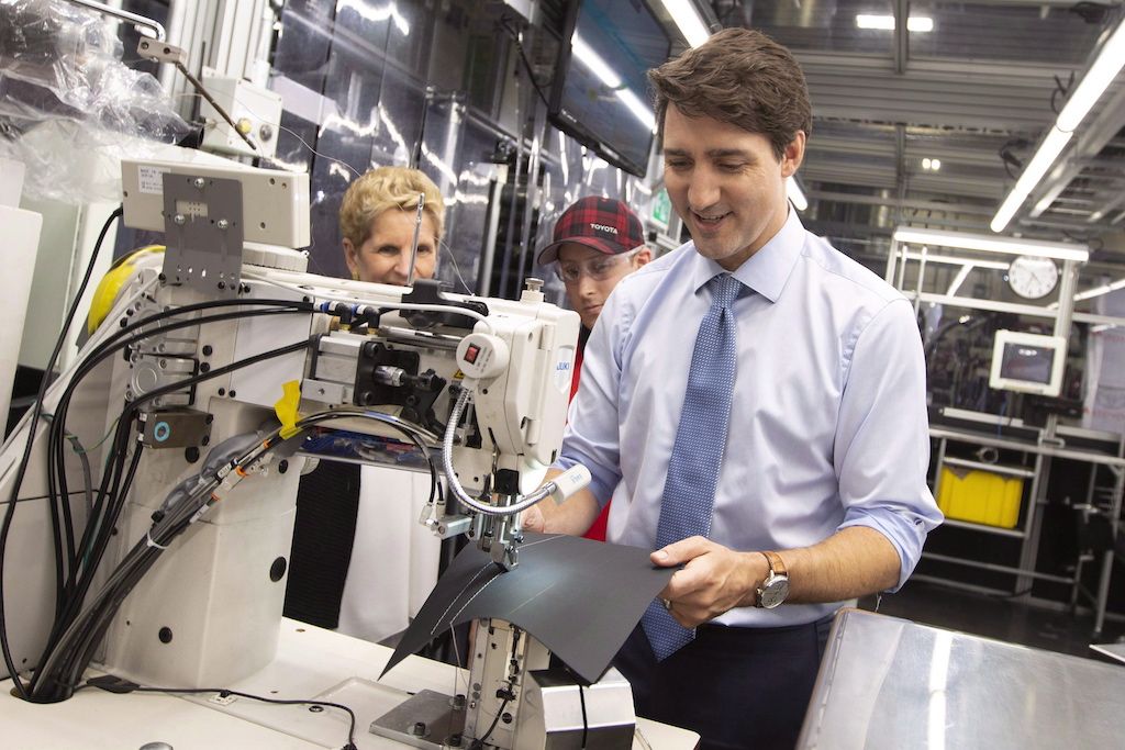 Prime Minister Justin Trudeau, with Ontario Premier Kathleen Wynne announcing a $110 million award for Toyota from the federal government's Strategic Innovation Fund in Cambridge, Ont. on May 4, 2018