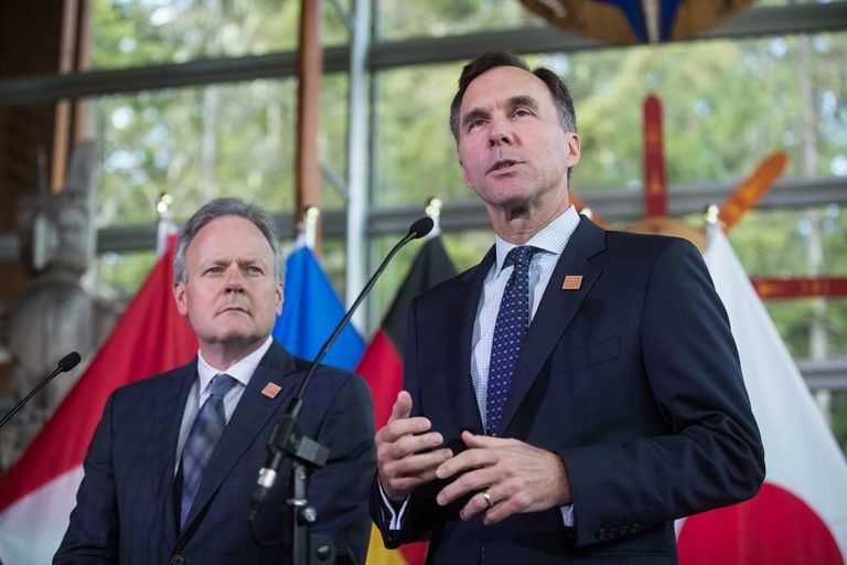 Finance Minister Bill Morneau and Bank of Canada Governor Stephen Poloz at the closing of the G7 finance ministers and central bank governors meeting in Whistler, British Columbia, Canada, in June 2018