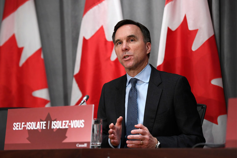 Finance Minister Bill Morneau speaks at a press conference on the federal government’s economic response to COVID-19 in Ottawa in March 2020.