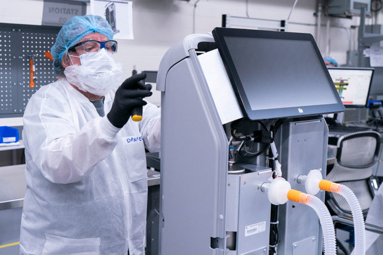 A worker assembles a CAE Air1 ventilator at the CAE plant in Montreal in June 2020. Ottawa has ordered 10,000 devices from the Canadian tech firm.