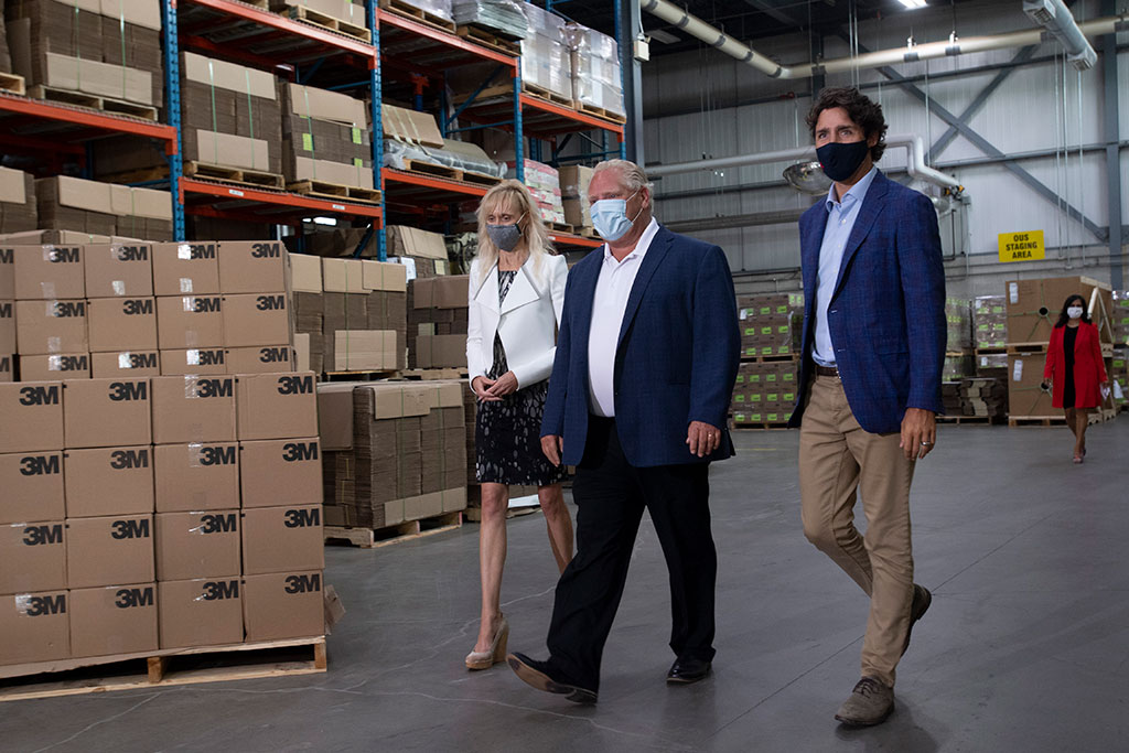 3M Canada president Penny Wise, Ontario Premier Doug Ford and Prime Minister Justin Trudeau at the announcement of the company’s new N95 facility in Brockville, Ont. in August 2020.