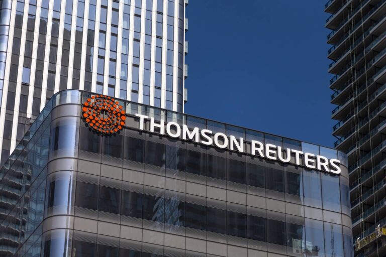 A shot of Thomson Reuters's logo on the top of an office building in Toronto's financial district.