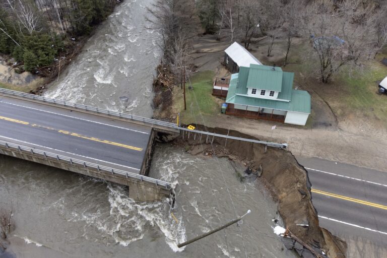 A river flows through a highway due to a flood in Quebec.