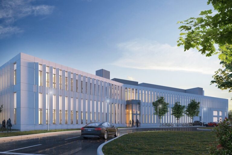 The National Research Council of Canada's building is displayed. A black car drives up in front.