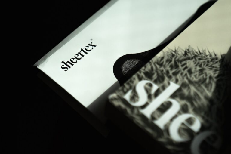 Sheertex branding on a handout illustration