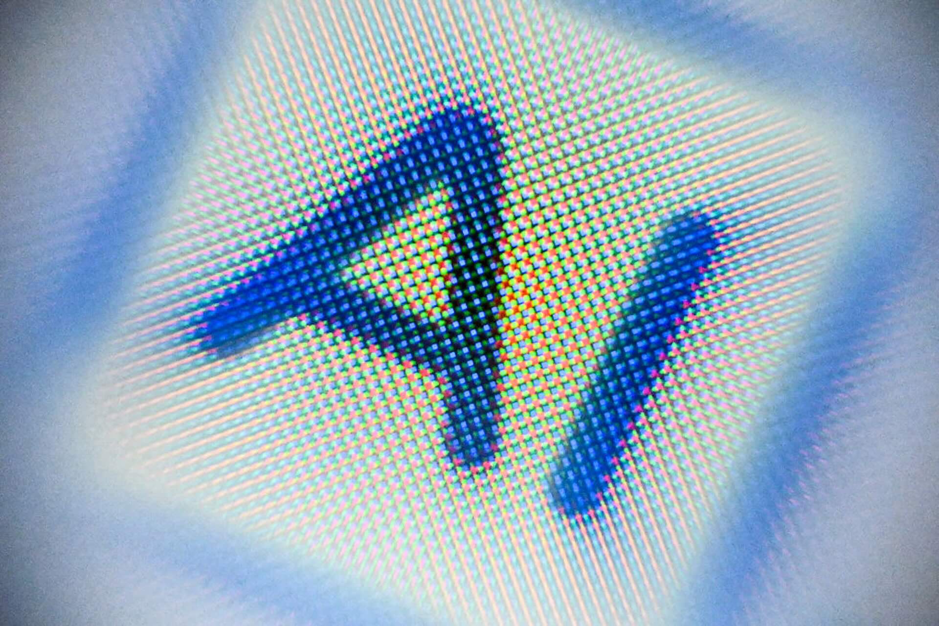 A logo that reads AI in blue lettering against a light yellow background.
